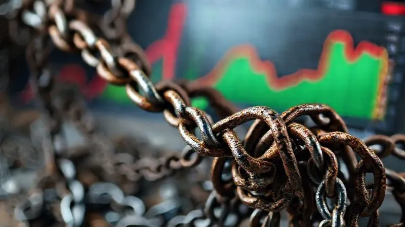 photorealistic, professional photography, 8K, cinematic lighting, sharp focus, depth of field, shot on a high-end DSLR, a complex tangle of thick, rusty chains representing multiple debts, slowly unraveling and becoming a single, smooth, gleaming silver chain. In the background, a business ledger transitions from red to green, symbolizing financial relief and improved cash flow.