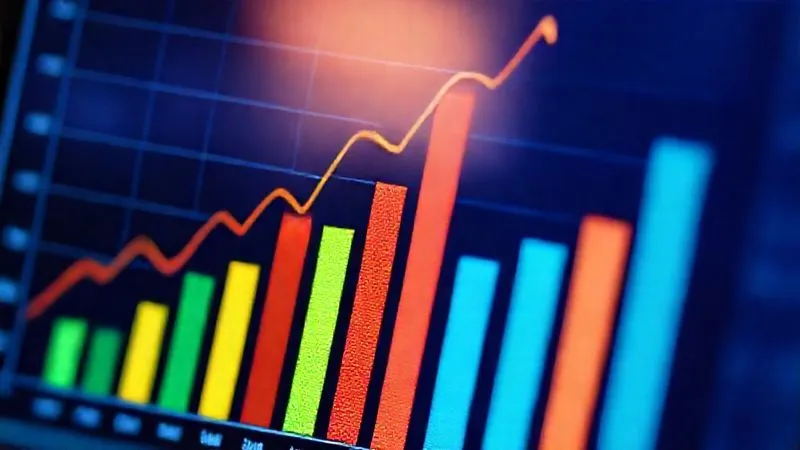 A close-up of a diverse investment portfolio chart on a digital screen, showing various asset classes represented by different colored bars, with a subtle upward trend, reflecting financial growth and diversification. Photorealistic, professional photography, 8K, cinematic lighting, sharp focus, depth of field, shot on a high-end DSLR.